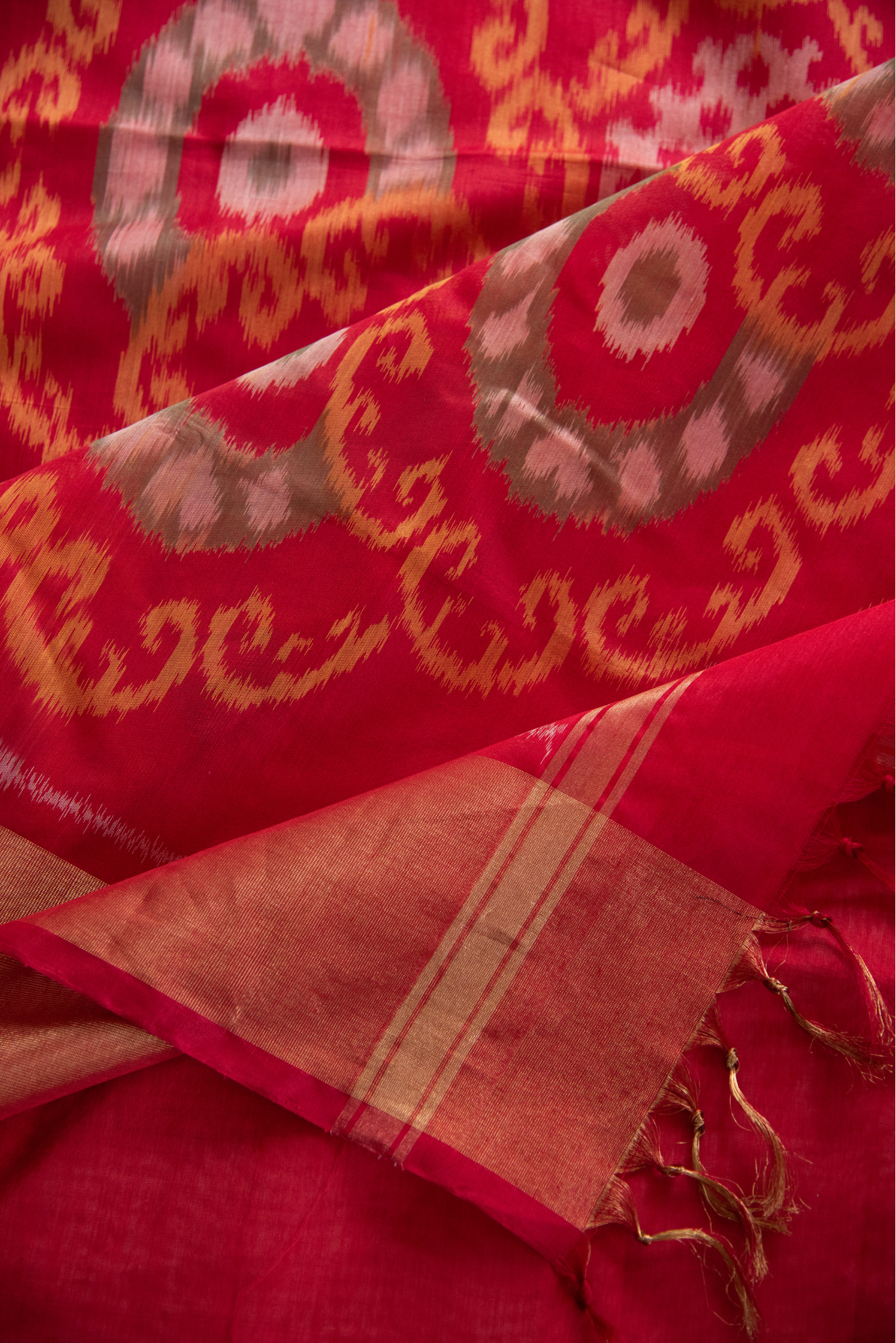 
                  
                    Silk Cotton Ikat Saree
                  
                