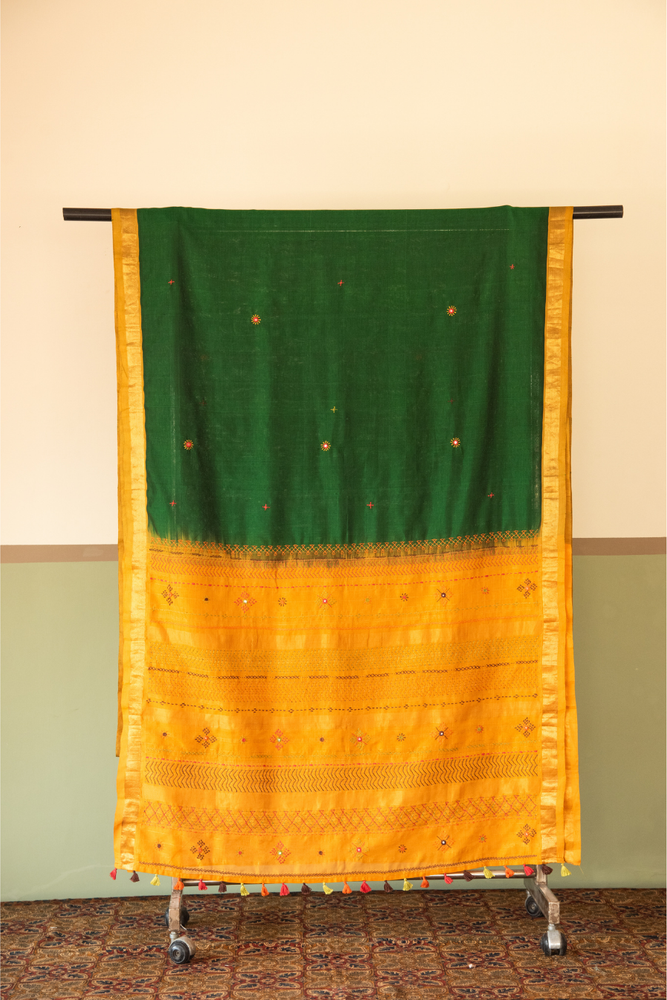 
                  
                    Silk Cotton Lambadiwork Saree
                  
                