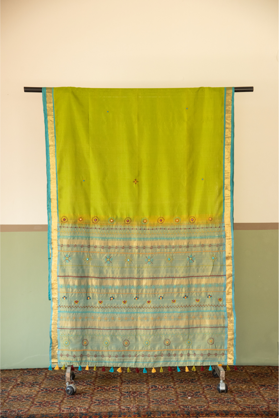 
                  
                    Silk Cotton Lambadiwork Saree
                  
                