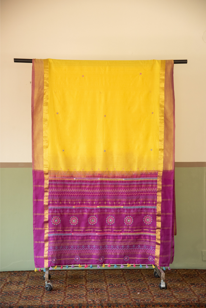 
                  
                    Silk Cotton Lambadiwork Saree
                  
                