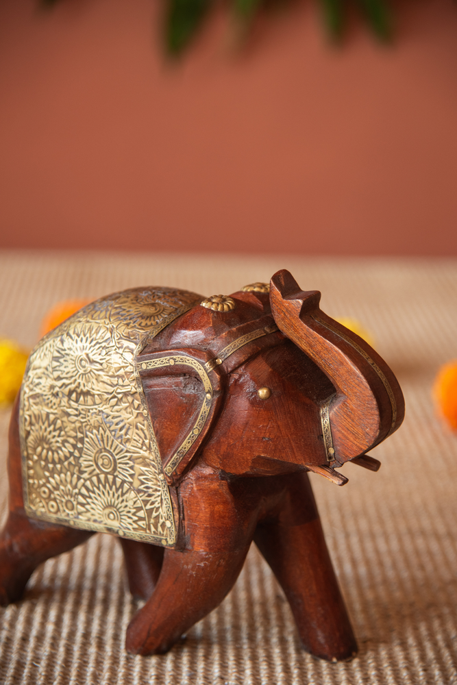 
                  
                    Wooden Elephant Brass Ftd
                  
                