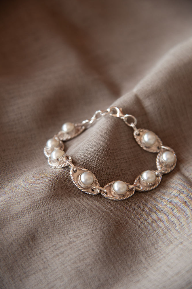 
                  
                    Pearl Bracelet
                  
                