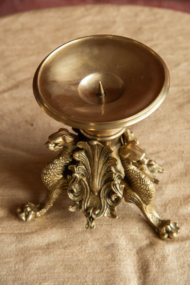 
                  
                    BRASS CANDLE STAND DRUGON
                  
                