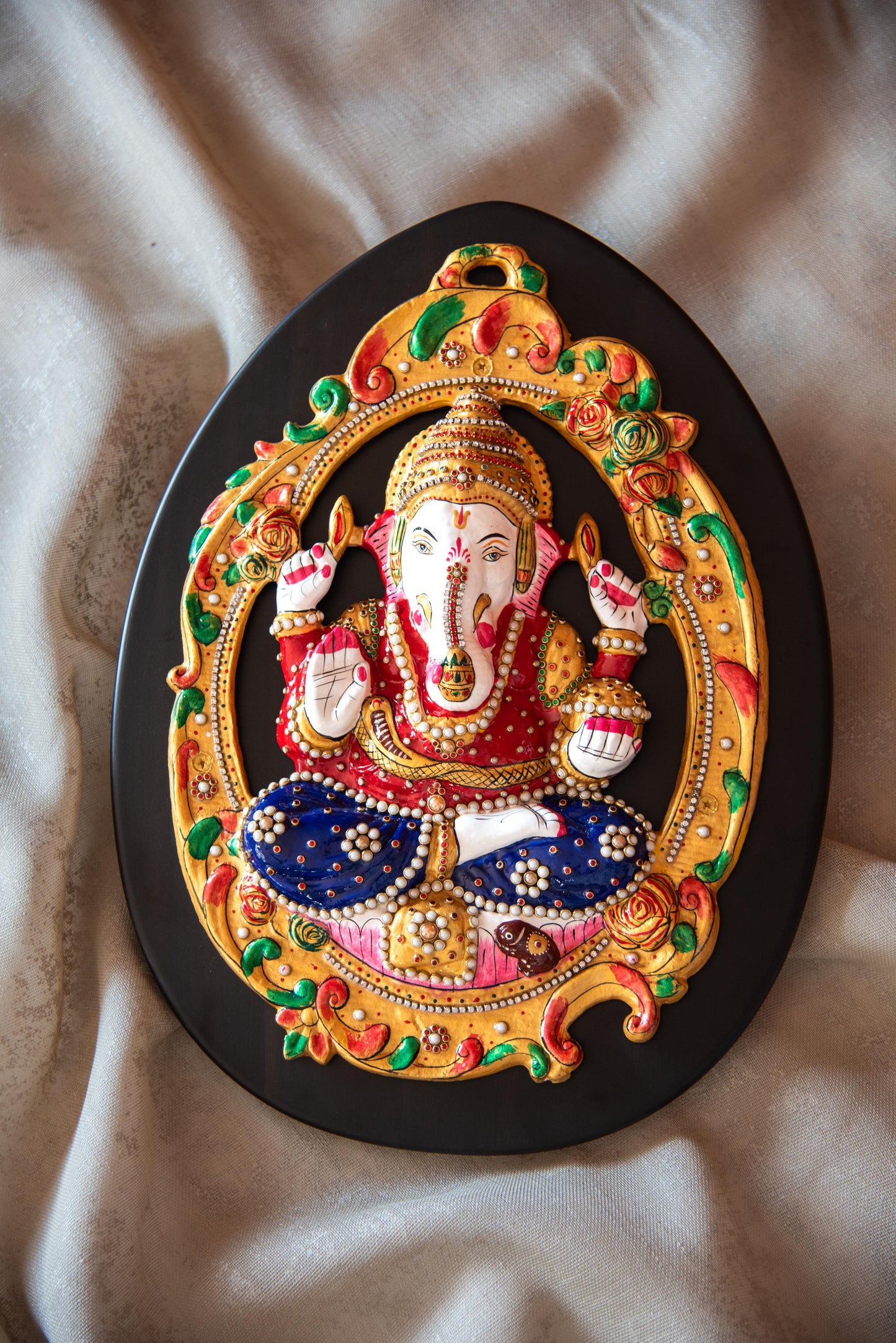 
                  
                    Metal Ganesh With Wooden Frame
                  
                