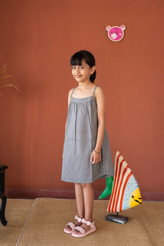 
                  
                    Girls Sleeveless Dress
                  
                