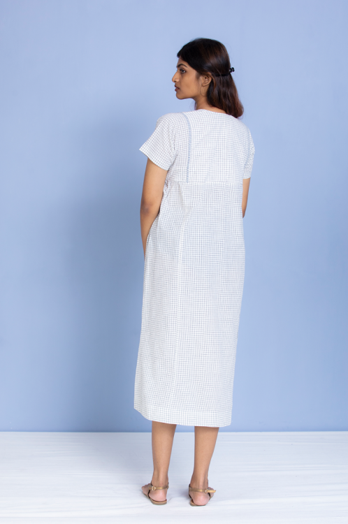 
                  
                    Kriya – White Handloom Cotton Long Pleated Dress
                  
                